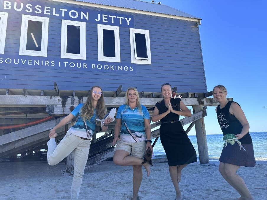 Environment Officer Viktoriya Hlamazda, Environment Manager Sophie Teede, CEO Lisa Shreeve and Katie Garnett from Katie Yoga strike a pose for marine conservation. Picture supplied. 