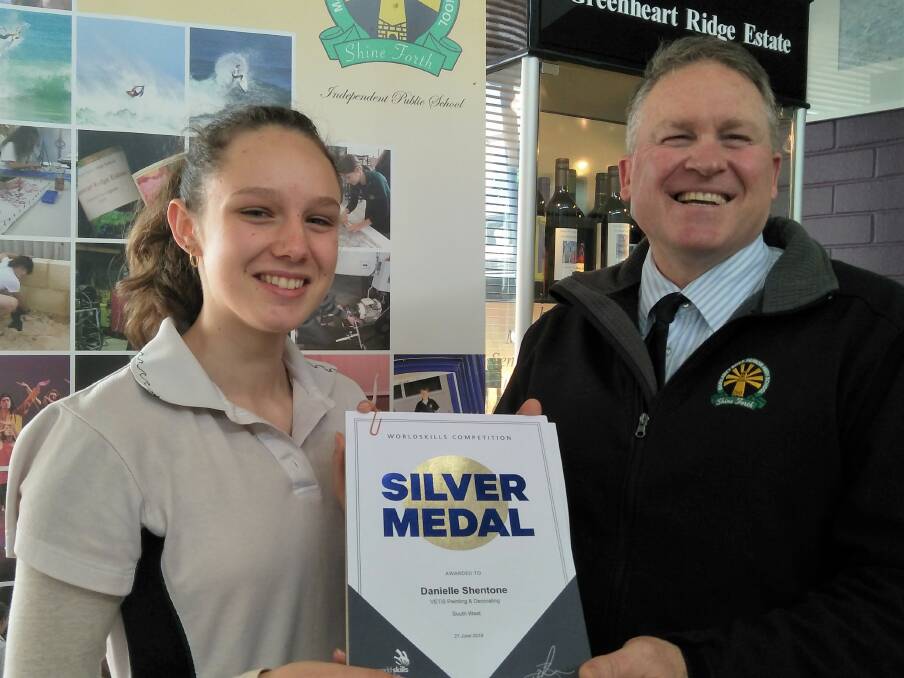 Yr11 Student Danielle Shentone with MRSHS Principal Andrew Host. 