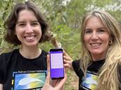 Nature Conservation staff Obelia Walker and Peta Lierich using the new weed identification and reporting app. Picture supplied. 