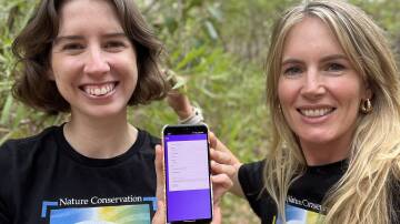 Nature Conservation staff Obelia Walker and Peta Lierich using the new weed identification and reporting app. Picture supplied. 